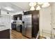 Well-equipped kitchen boasting stainless steel appliances and wood flooring at 1235 S Highland Ave # 2-207, Clearwater, FL 33756