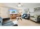 Inviting living room with comfortable seating, natural light and modern decor at 1235 S Highland Ave # 2-207, Clearwater, FL 33756