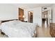Comfortable main bedroom with wood accents and closet access at 1235 S Highland Ave # 2-207, Clearwater, FL 33756
