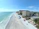 Coastal view of beachside condo and resorts featuring the sunny Clearwater beach coastline at 12419 Dawn Vista Dr, Riverview, FL 33578