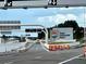 Entrance to Tampa International Airport with signage, road construction, and visible airplanes in the background at 12419 Dawn Vista Dr, Riverview, FL 33578