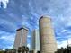 Impressive view of towering skyscrapers against a bright blue sky, highlighting the city's modern architecture and urban landscape at 12419 Dawn Vista Dr, Riverview, FL 33578