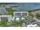 A condo building boasts waterfront views, lush landscaping, and convenient parking at 1332 Pasadena S Ave # 503, South Pasadena, FL 33707