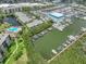 Aerial view of marina and complex with pool and lake at 1332 Pasadena S Ave # 503, South Pasadena, FL 33707