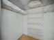 Walk-in closet featuring wire shelving for ample storage space at 1332 Pasadena S Ave # 503, South Pasadena, FL 33707