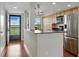 Kitchen with wood floors, stainless appliances, granite counters and an eat-in area at 1332 Pasadena S Ave # 503, South Pasadena, FL 33707
