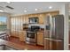 Kitchen featuring stainless appliances, granite counters, built in cabinets and an eat-in area at 1332 Pasadena S Ave # 503, South Pasadena, FL 33707