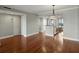 Spacious living room with hardwood flooring and open access to the kitchen area at 1332 Pasadena S Ave # 503, South Pasadena, FL 33707