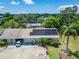 Aerial view showcasing the home's location, solar panels, landscaping, and proximity to nearby amenities at 1349 New Bedford Dr # 6, Sun City Center, FL 33573