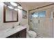 Bathroom with a glass-enclosed shower, vanity, and toilet at 1349 New Bedford Dr # 6, Sun City Center, FL 33573