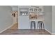 Kitchen with a breakfast bar and bar stools, great for informal dining and entertaining at 1349 New Bedford Dr # 6, Sun City Center, FL 33573
