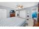 Bedroom featuring tile flooring and ensuite bathroom at 14884 Cromwell Dr, Clearwater, FL 33764