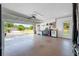 Open garage with an operational door and a service entrance to the yard at 14884 Cromwell Dr, Clearwater, FL 33764