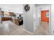 Hallway view of living area and bedrooms, featuring ceramic tile, and neutral paint colors at 14884 Cromwell Dr, Clearwater, FL 33764