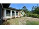 Backyard view with three large windows providing an abundance of light at 150 Tompkins St, Port Charlotte, FL 33954