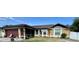 Charming single-story home with well-maintained landscaping and inviting curb appeal at 150 Tompkins St, Port Charlotte, FL 33954