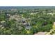 Secluded residence with pool enveloped by flourishing trees provides an element of seclusion and natural beauty at 17519 Drake Ct, Lutz, FL 33559