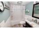 Clean, functional bathroom with shower-tub combo, granite vanity, and modern fixtures at 1975 W Bay Dr # 301, Largo, FL 33770