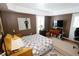 Comfortable bedroom features a queen bed, natural light, and cozy decor for relaxation at 1975 W Bay Dr # 301, Largo, FL 33770