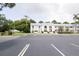 Well-maintained condominium complex with manicured landscaping and ample parking at 1975 W Bay Dr # 301, Largo, FL 33770