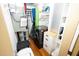 Efficient laundry area with washer, dryer, and storage solutions for organized chores at 1975 W Bay Dr # 301, Largo, FL 33770