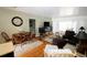 Inviting living room and dining area with hardwood floors at 1975 W Bay Dr # 301, Largo, FL 33770