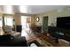 Comfortable living and dining area featuring hardwood floors at 1975 W Bay Dr # 301, Largo, FL 33770