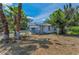 Cozy single-Gathering home with mature trees, a small porch, and a well-maintained lawn at 2001 29Th N Ave, St Petersburg, FL 33713
