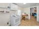 This efficient kitchen features a white oven and offers an adjacent eating area at 2001 29Th N Ave, St Petersburg, FL 33713