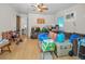 Spacious living room with hardwood floors and a ceiling fan, currently occupied at 2001 29Th N Ave, St Petersburg, FL 33713
