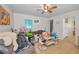 Spacious living room with hardwood floors and a ceiling fan, currently occupied at 2001 29Th N Ave, St Petersburg, FL 33713