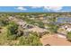 Desirable neighborhood with many homes, mature trees, and a serene lake at 20632 Broadwater Dr, Land O Lakes, FL 34638