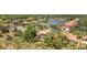 Neighborhood with mature trees, well-maintained homes, and a small lake at 20632 Broadwater Dr, Land O Lakes, FL 34638