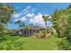 Spacious screened lanai and fenced backyard provides the perfect spot for outdoor entertaining at 20632 Broadwater Dr, Land O Lakes, FL 34638