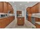 Spacious kitchen with stainless steel appliances, granite countertops, and ample storage space at 20632 Broadwater Dr, Land O Lakes, FL 34638
