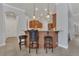 Kitchen features counter seating, pendant lighting, and seamless access to the adjacent living areas at 20632 Broadwater Dr, Land O Lakes, FL 34638