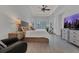 Serene main bedroom with tray ceiling, neutral tones, and plenty of natural light at 20632 Broadwater Dr, Land O Lakes, FL 34638