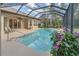 Inviting screened pool area with spa, provides a relaxing outdoor space for leisure and enjoyment at 20632 Broadwater Dr, Land O Lakes, FL 34638