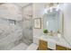 Stylish bathroom featuring modern vanity, tiled walls, and a walk-in shower at 2220 Calexico S Way, St Petersburg, FL 33712