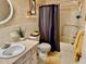 Bathroom with a vanity sink, tiled walls, framed mirror, and a shower-tub combo at 2254 Norwegian Dr # 46, Clearwater, FL 33763