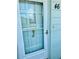 A close up of the front door with the house number 46 at 2254 Norwegian Dr # 46, Clearwater, FL 33763