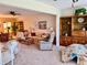 Spacious living room with comfortable seating, built-in shelves, and large windows at 2254 Norwegian Dr # 46, Clearwater, FL 33763