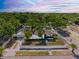 Charming fenced home with lush, mature landscaping and a detached two-car garage at 2322 21St S St, St Petersburg, FL 33712