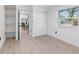 This bedroom is bright with natural light, storage closet and overlooks kitchen and dining area at 2322 21St S St, St Petersburg, FL 33712