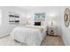 Inviting bedroom with white linens, neutral accents, and soft natural light at 2322 21St S St, St Petersburg, FL 33712