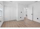 Bright bedroom featuring wood-look floors and closet with sliding doors at 2322 21St S St, St Petersburg, FL 33712