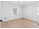 Bright bedroom featuring wood-look floors and windows at 2322 21St S St, St Petersburg, FL 33712