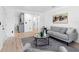 Open floor plan shows a living room next to the kitchen with stainless steel appliances at 2322 21St S St, St Petersburg, FL 33712