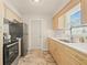 Bright kitchen features modern stainless steel appliances and stylish countertops at 2410 E Bougainvillea Ave, Tampa, FL 33612