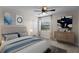 Cozy bedroom with a ceiling fan, carpeted floors, and a sunny window at 2513 Buckhorn Run Dr, Valrico, FL 33596